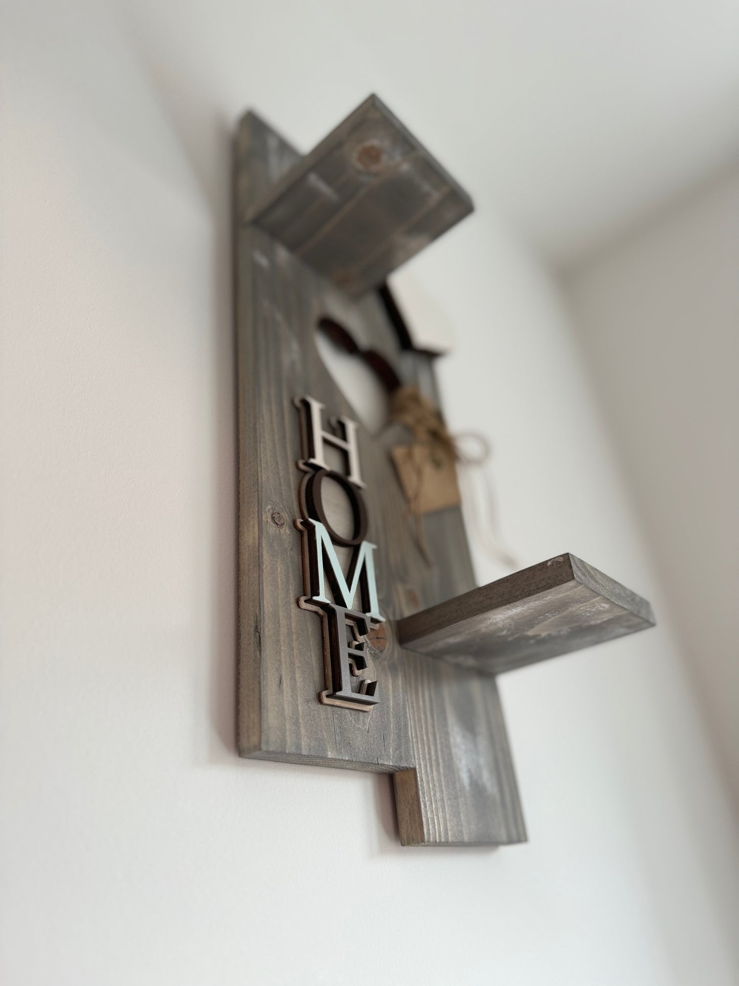 Shelf with HOME Sign