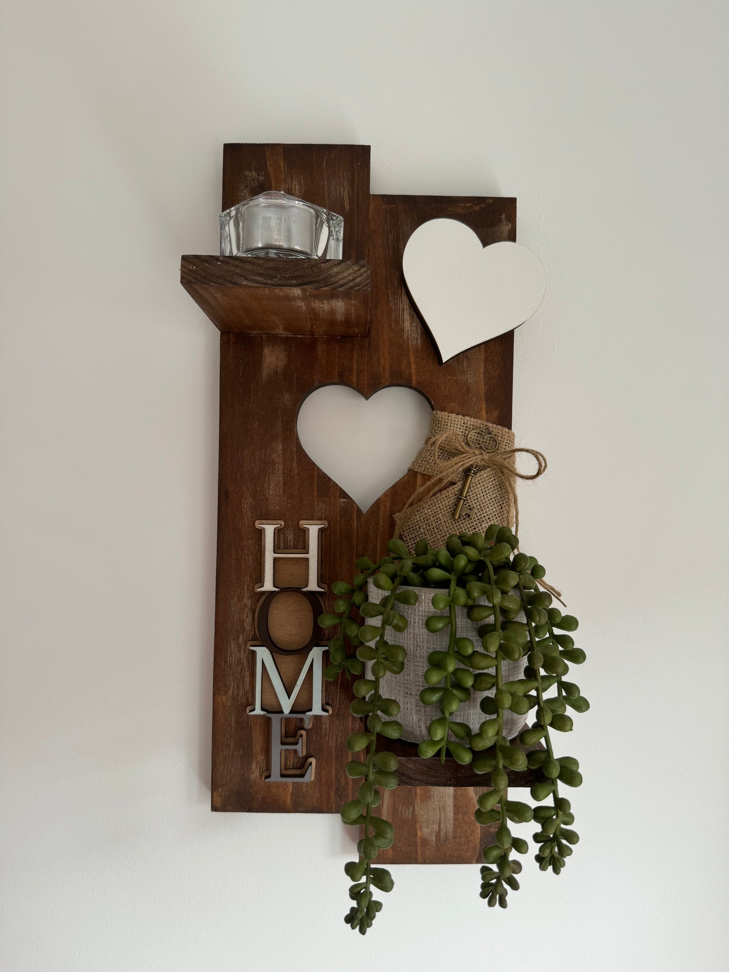 Shelf with HOME Sign